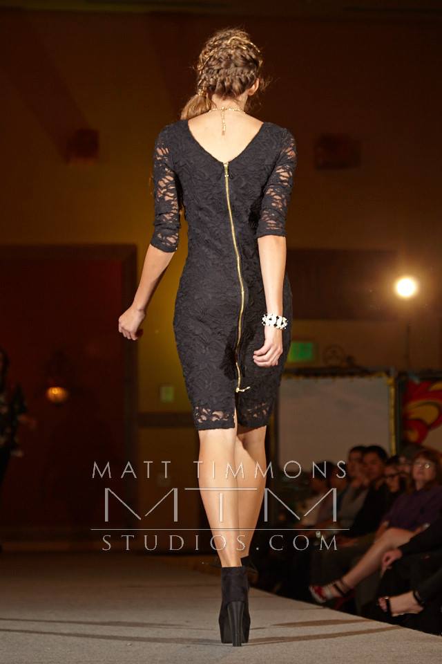 Black Lace Holiday Collection Dress from the back with gold zipper detail