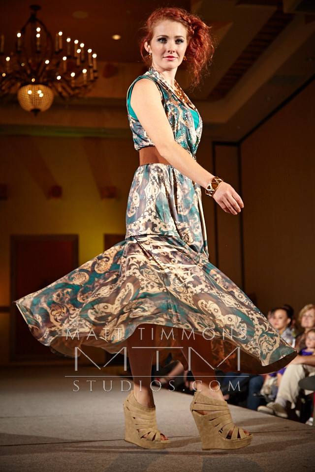Allie Ollie Emerald Elegance spinning on the runway at Santa Fe Fashion Week