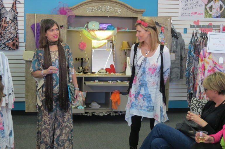 Allie Olson of Allie Ollie in tunic explaining Camp Soaring Eagles Makeovers for Moms Event
